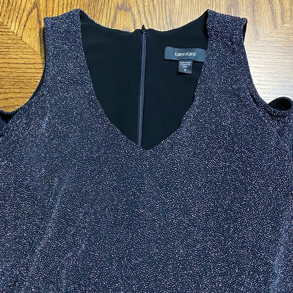 Karen Kane Sparkle Starlight Silver / Black
Cold Shoulder Jumpsuit
Size S - Picture 4 of 15